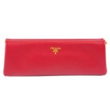 PRADA - a red Saffiano leather clutch.