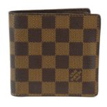 LOUIS VUITTON - a Damier Ebene Bifold wallet.