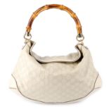 GUCCI - an ivory Guccissima Bamboo Peggy GM handbag.