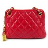 CHANEL - a vintage red quilted leather handbag.