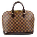 LOUIS VUITTON - a Damier Ebene Alma PM handbag.