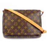 LOUIS VUITTON - a Monogram Musette Tango handbag.