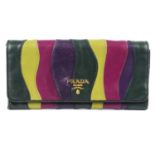 PRADA - a leather wallet.