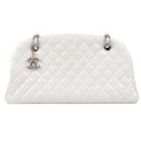 CHANEL - a white Just Mademoiselle Bowling handbag.