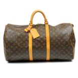 LOUIS VUITTON - a Monogram Keepall 55 luggage bag.