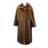 A full-length demi-buff mink coat.