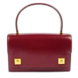 HERMÈS - a burgundy Box Calf Little Piano handbag.