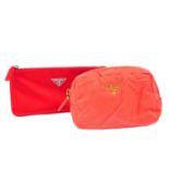 PRADA - a small red stain purse and an orange nylon make-up pouch.