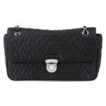 PRADA - a black quilted nylon handbag.