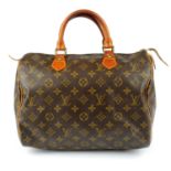 LOUIS VUITTON - a Monogram Speedy 30 handbag.