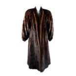 A full-length ranch mink coat.