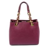 MICHAEL KORS - a purple Saffiano leather handbag.