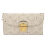 LOUIS VUITTON - a cream Amelia Perforated Monogram Mahina wallet.