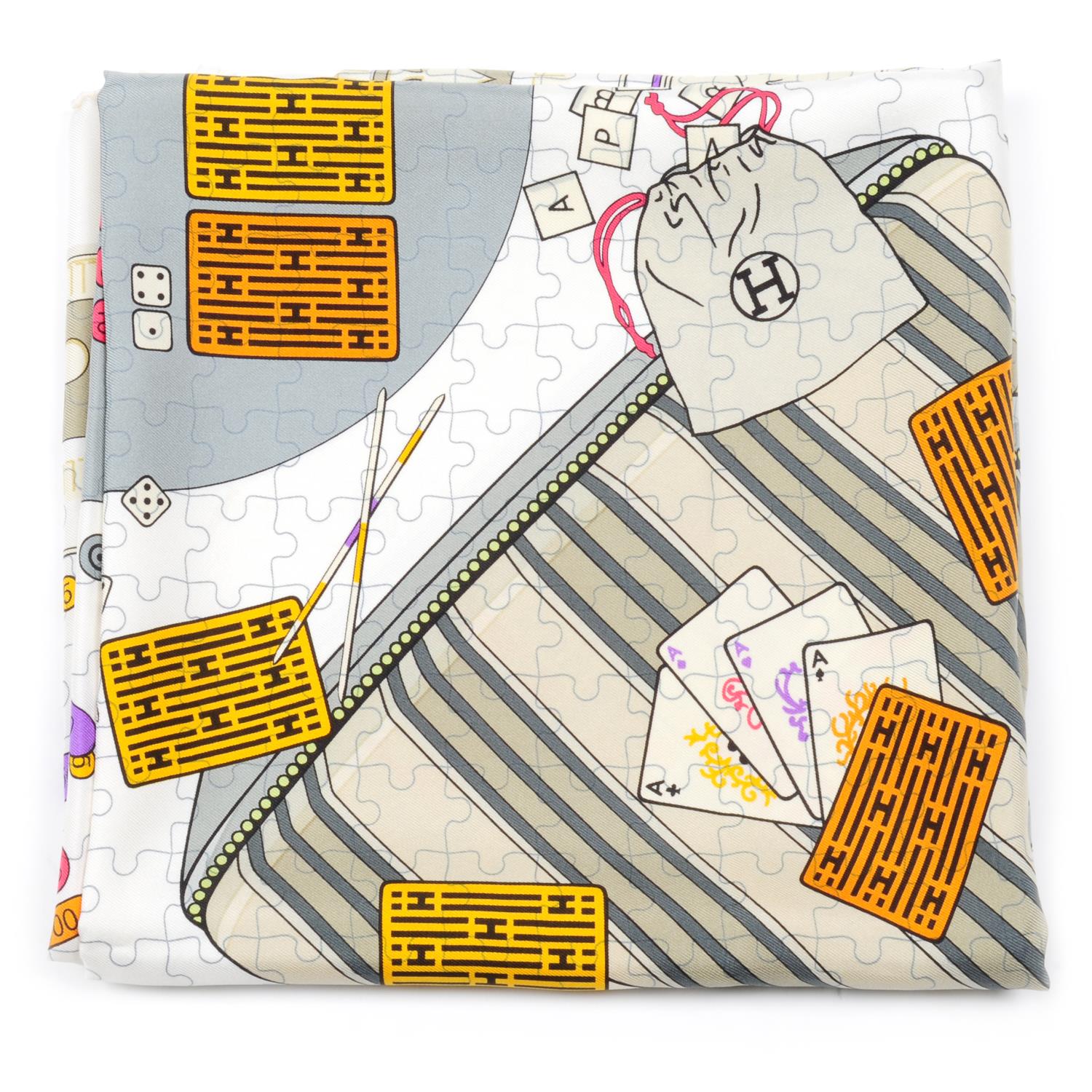 HERMÈS - a 'Faites Vos Jeux' silk scarf.