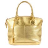 LOUIS VUITTON - a gold Suhali Lockit handbag.