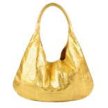 DELVI KROELL - a large gold python skin hobo handbag.