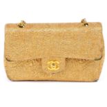 CHANEL - an early 90's gold lamé Small Classic Double Flap handbag.