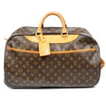 LOUIS VUITTON - a Monogram Eole 50 rolling duffle bag.