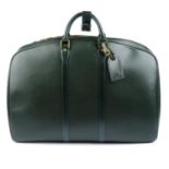 LOUIS VUITTON - a green Taiga Kendall GM luggage bag with garment cover.