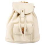 GUCCI - an ivory leather bamboo backpack.