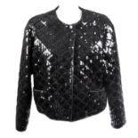 CHANEL - a black sequin jacket.