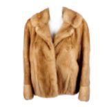 A pastel mink jacket.