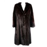 A full-length ranch mink coat.