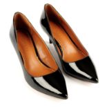 COACH - a pair of kitten heels.