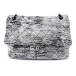 CHANEL - a Maxi Single Flap woollen handbag.