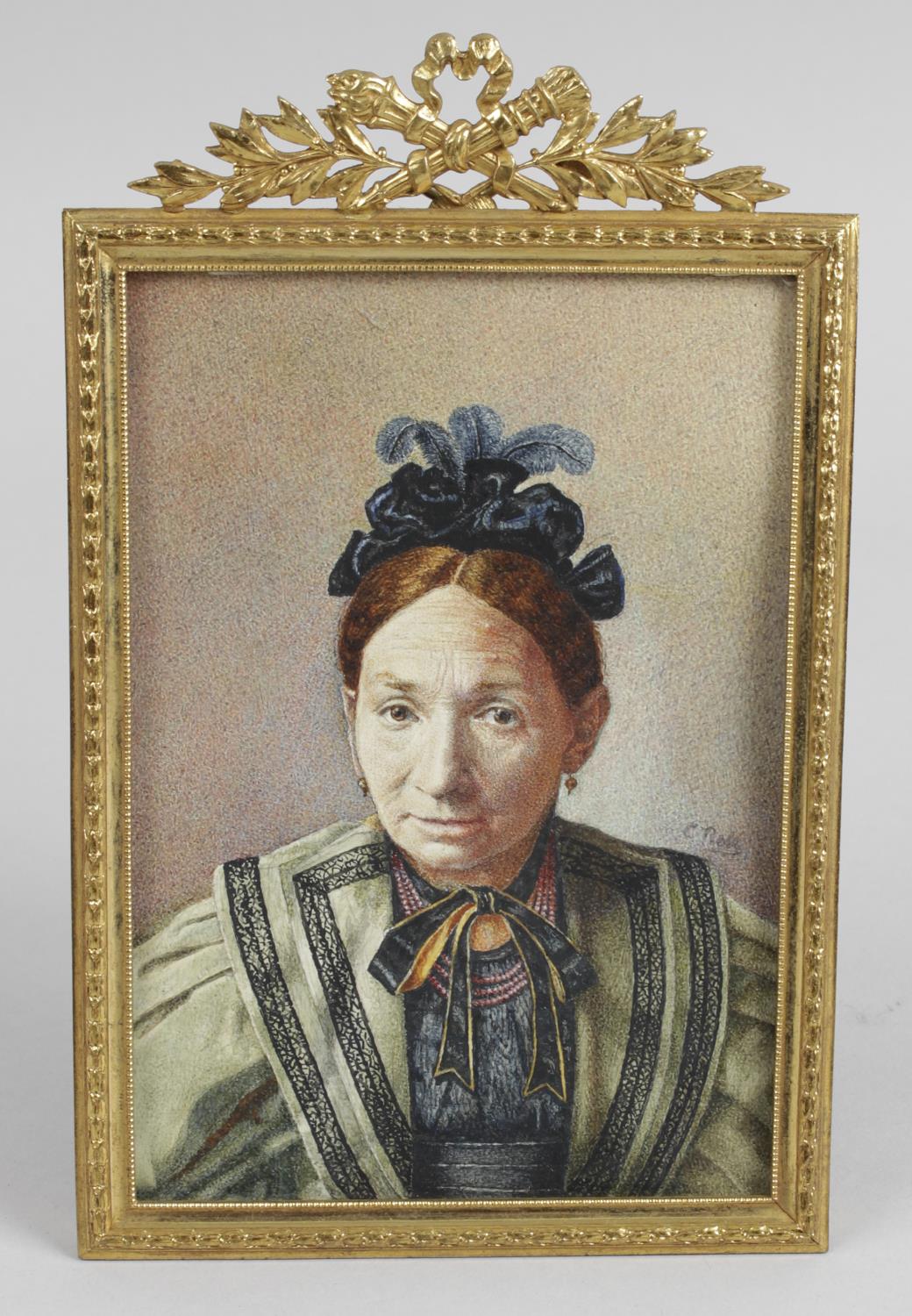 An early 20th century rectangular head and shoulder painted portrait miniature depicting an elderly