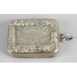 A George IV silver-gilt pendant vinaigrette,