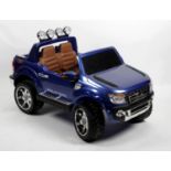 A children's Ford Ranger Wild Trak battery operated electric toy car,