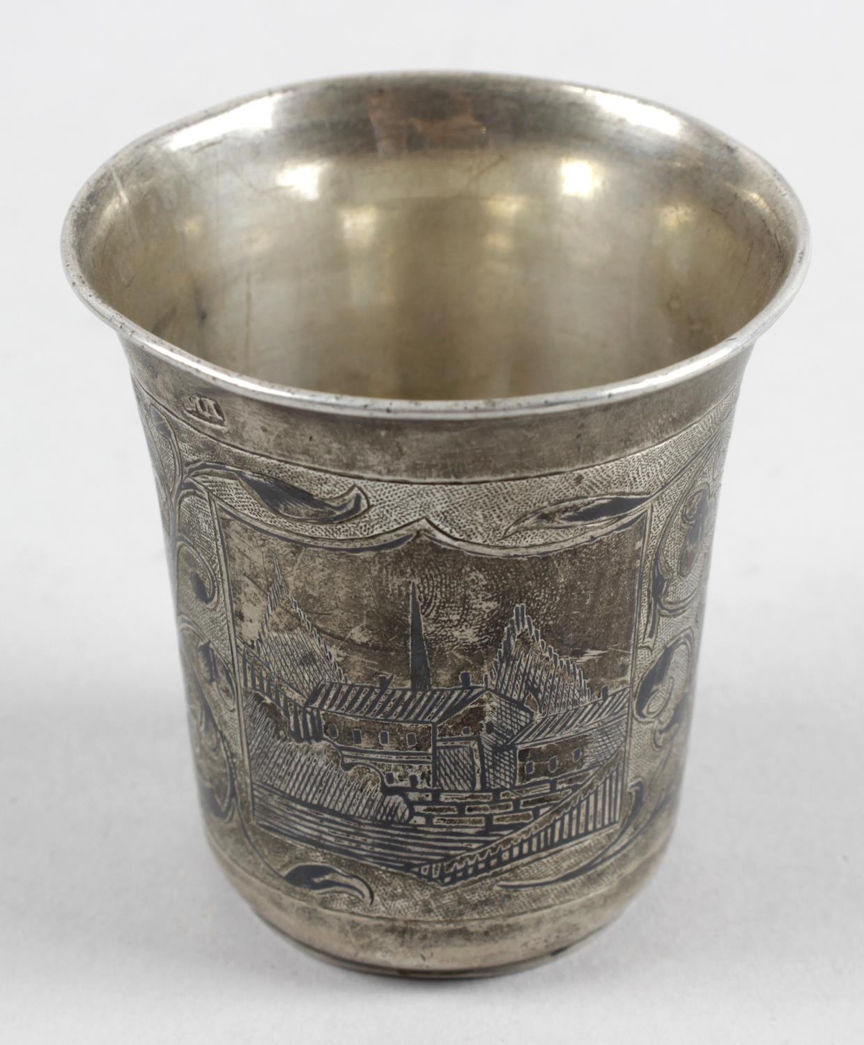 A mid-nineteenth Russian silver and niello vodka cup,