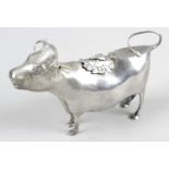 A modern silver cow creamer,