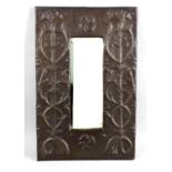 An Arts and Crafts copper mirror,