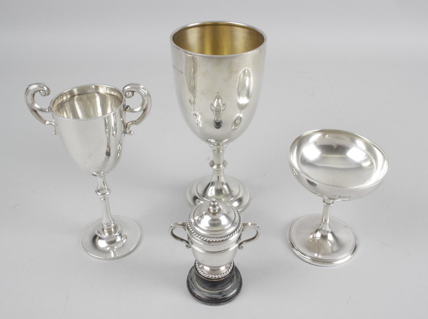 A 1930's miniature silver trophy cup and cover with twin handles and rope twist border detail, - Image 2 of 6