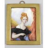 A large 19th century painted portrait miniature on ivory,