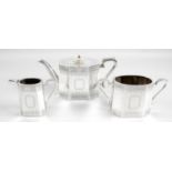 A late Victorian silver three piece tea service,