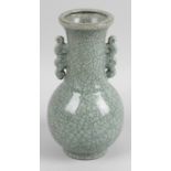 A late 19th century Chinese twin handled crackle glazed vase, 10.25 (26cm) high.