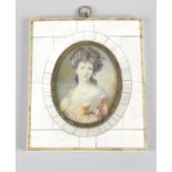 A 19th century oval painted portrait miniature on ivory,