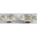 A pair of silver trinket dishes,