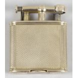 A Dunhill 9ct gold cased cigarette lighter,