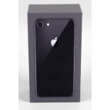 A boxed iPhone 256GB in grey.
