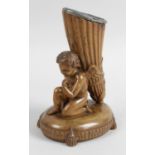 A Regency carved walnut spill holder,