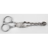 A pair of mid-eighteenth century silver sugar nips of scissor form with personally initialled hinge