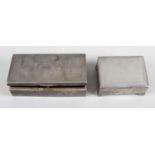 Two silver mounted cigarette boxes,