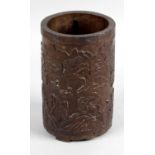 A late 19th century Chinese carved bitong or brush pot,