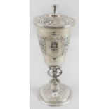 A large Edwardian silver cup and cover in Arts & Crafts style,