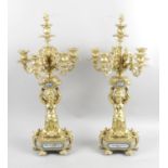 A pair of 19th century gilt ormolu candle holders,