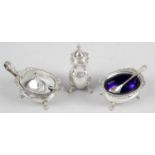 A modern silver three piece condiment set comprising mustard pot and open salt with blue glass